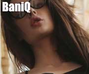 BaniQ - A cute brunette wearing glasses, has the student look
