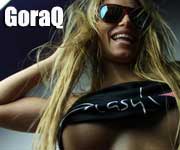 GoraQ - she's wearing shades and smiling with some serious underboob on display